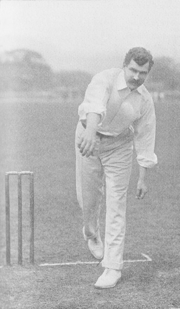 Ein Mann in einem weißen Hemd und Hosen spielt Cricket mit Wickets auf dem Boden, Bäumen und Himmel im Hintergrund, mit dem Text "Cricket-Spieler des Jahres" unten.